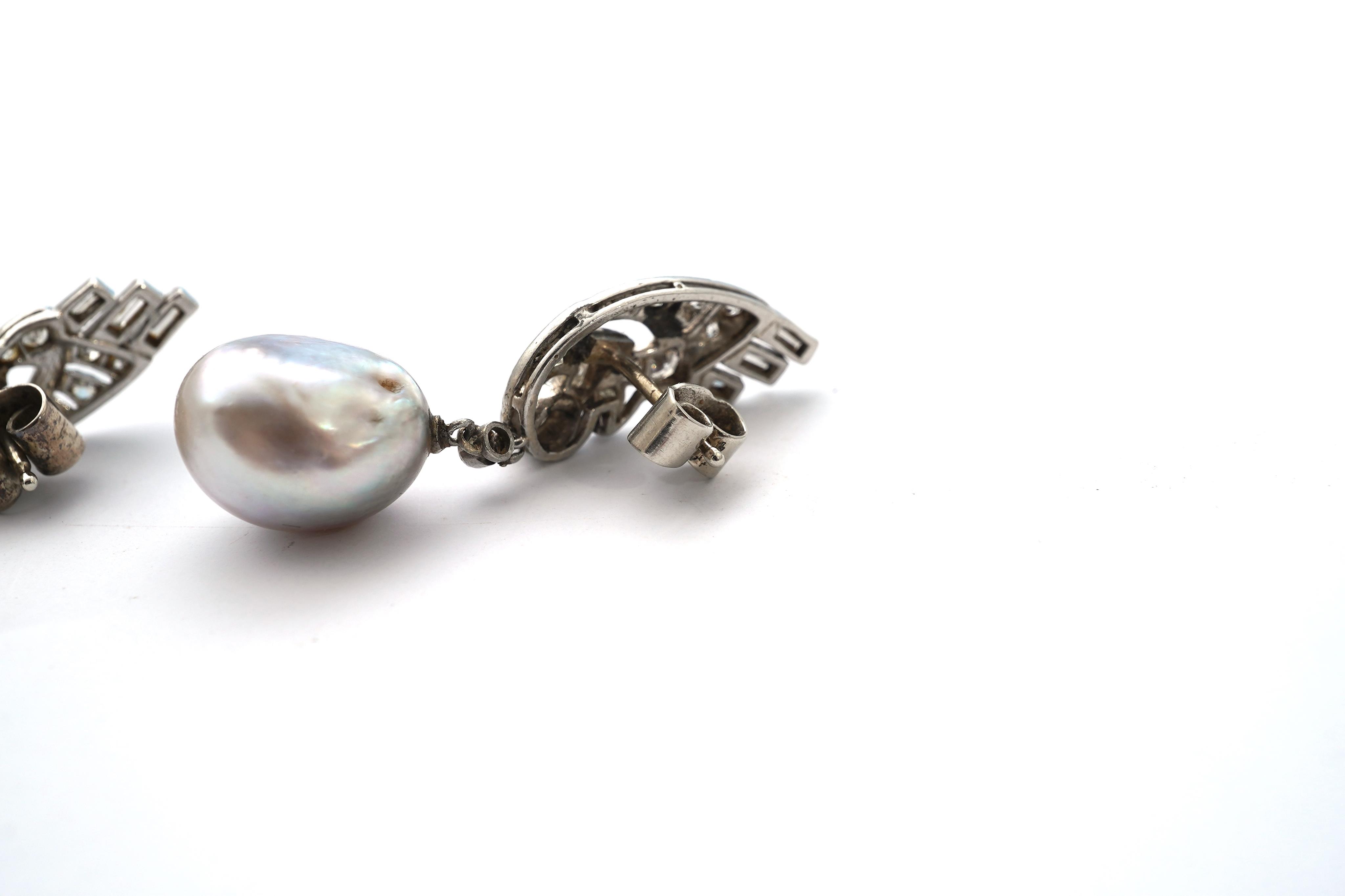 A fine pair of Art Deco natural pearl and diamond earrings, 1930s